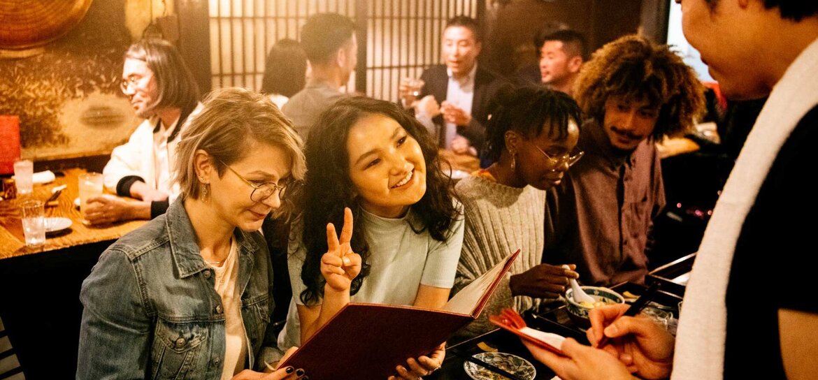Anticipation: Woman orders in restaurant Anticipation: Woman orders in restaurant