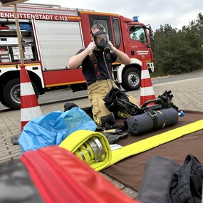 Atemschutzmaske ablegen