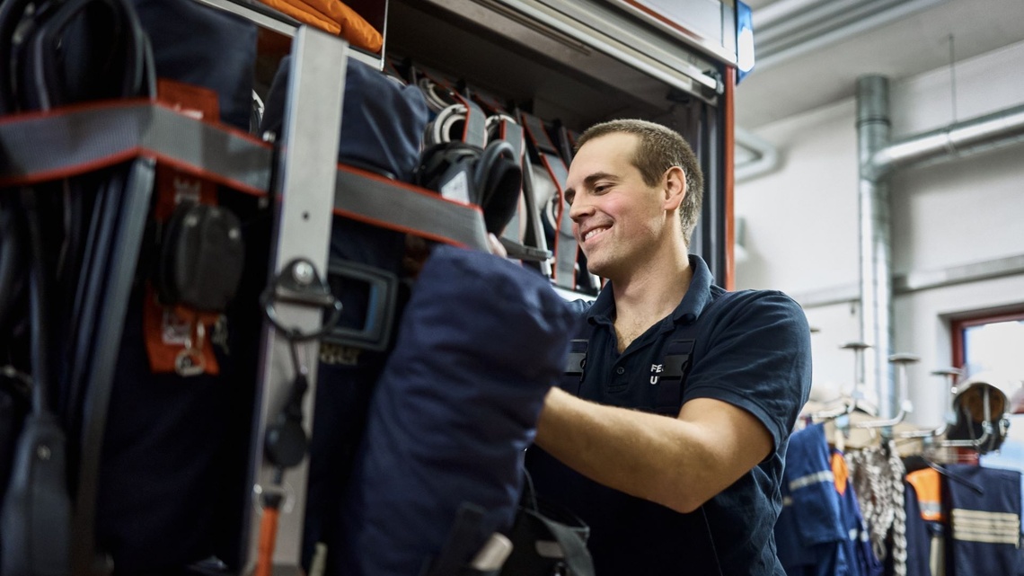 Chris checks the firefighting equipment.
