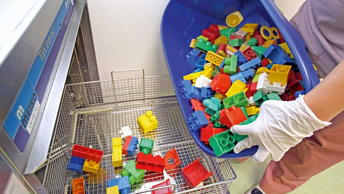 Toy bricks are put into the TopClean 60 from Meiko to be cleaned Toy bricks are put into the TopClean 60 from Meiko to be cleaned