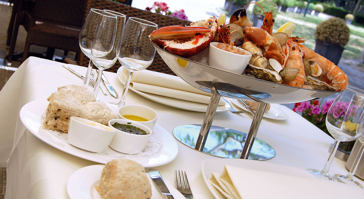 Table set with clean dishes Table set with delicious food and clean dishes
