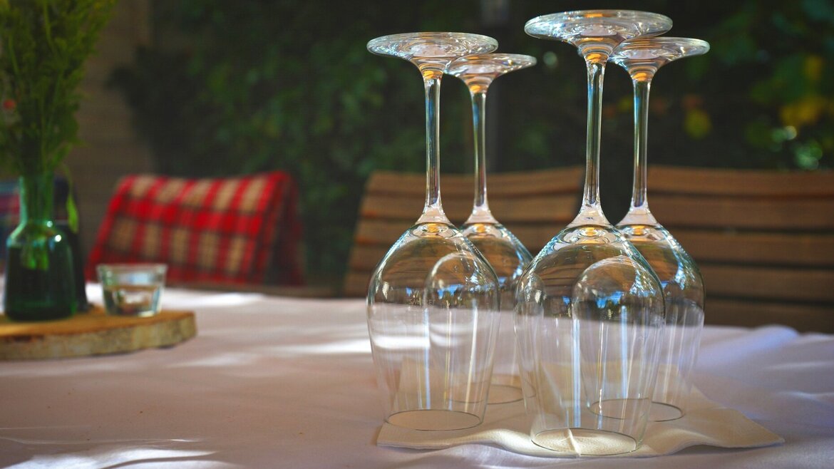 Wine glasses on a restaurant table Wine glasses on a restaurant table
