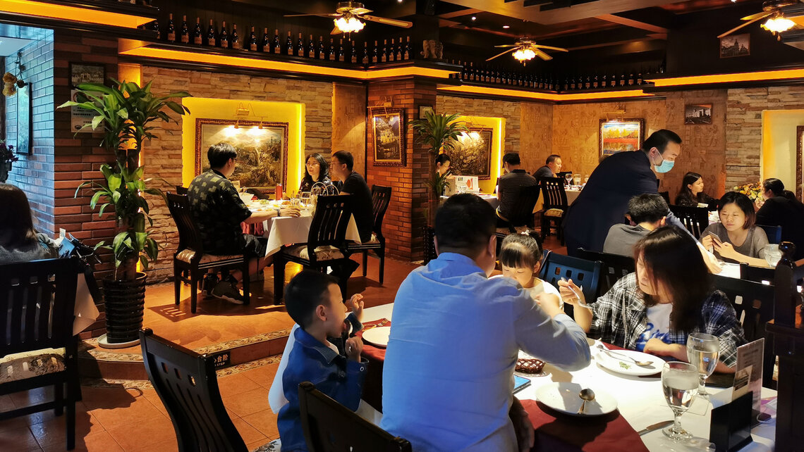 Customers enjoy their meal at St. Louis Portuguese Restaurant