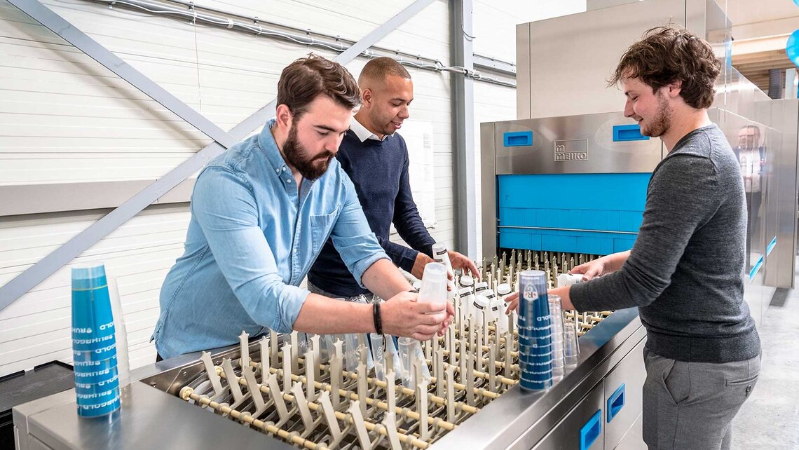 Spotless and dry, that's how hard cups reemerge after being cleaned in Meiko's M-iQ flight type dishwashing machine.