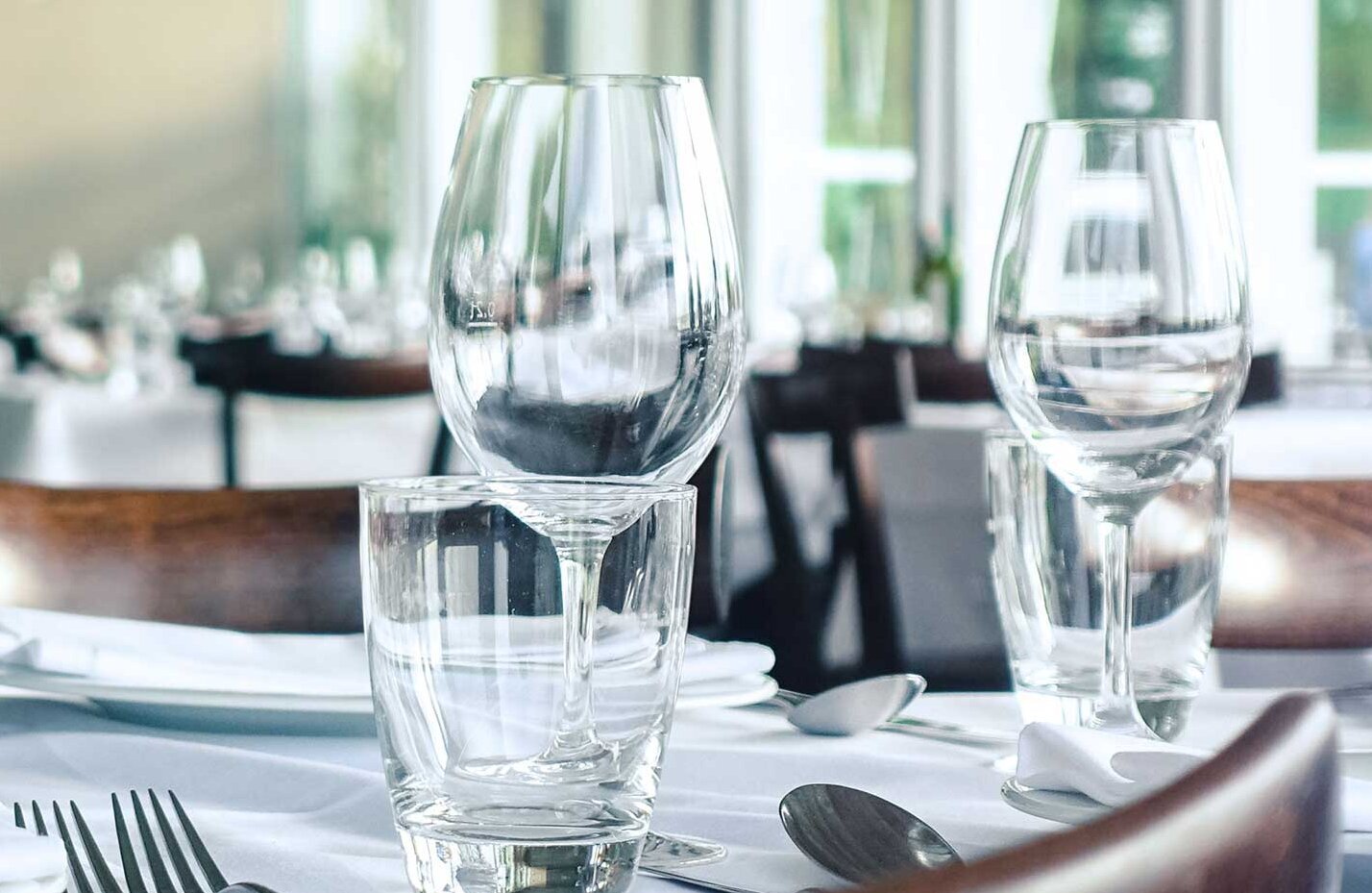 shiny glasses on a table shiny glasses on a table