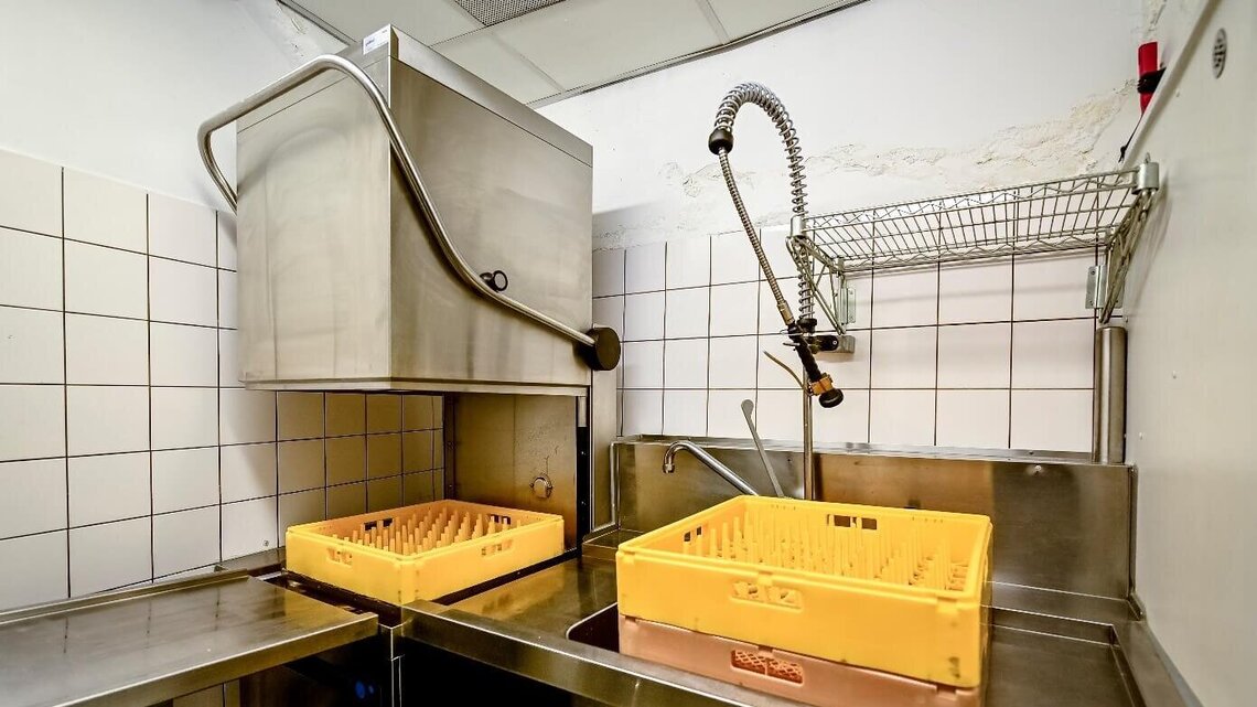 The MEIKO hood type dishwashing machine in the dishwashing area